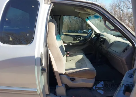 2001 Ford F-150 Lariat/Xl/Xlt z USA, uszkodzony, nr VIN 1FTRX18W11NA21896